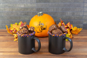 Halloween decorated mugs filled with 22 minute cake bites